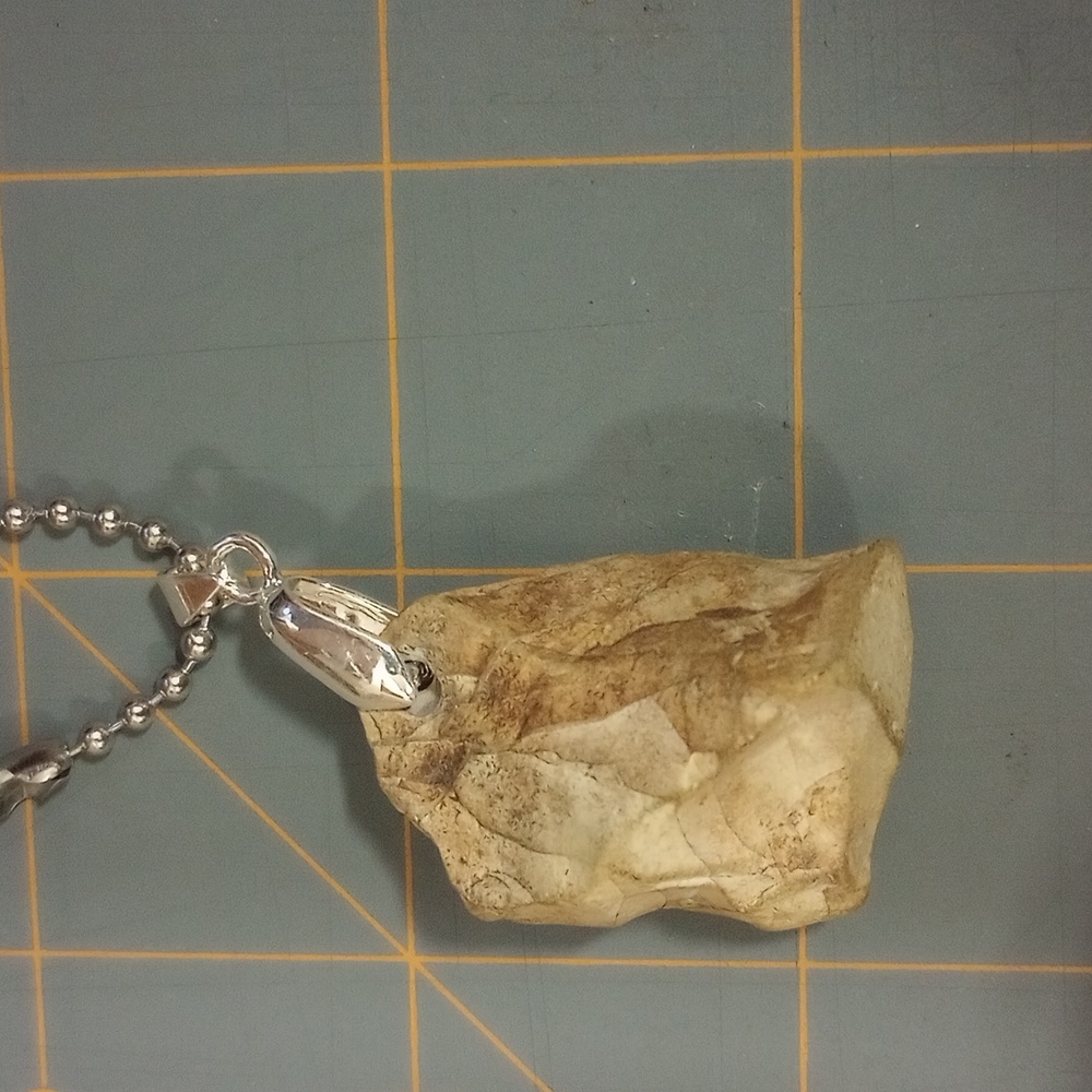 Carved pendant